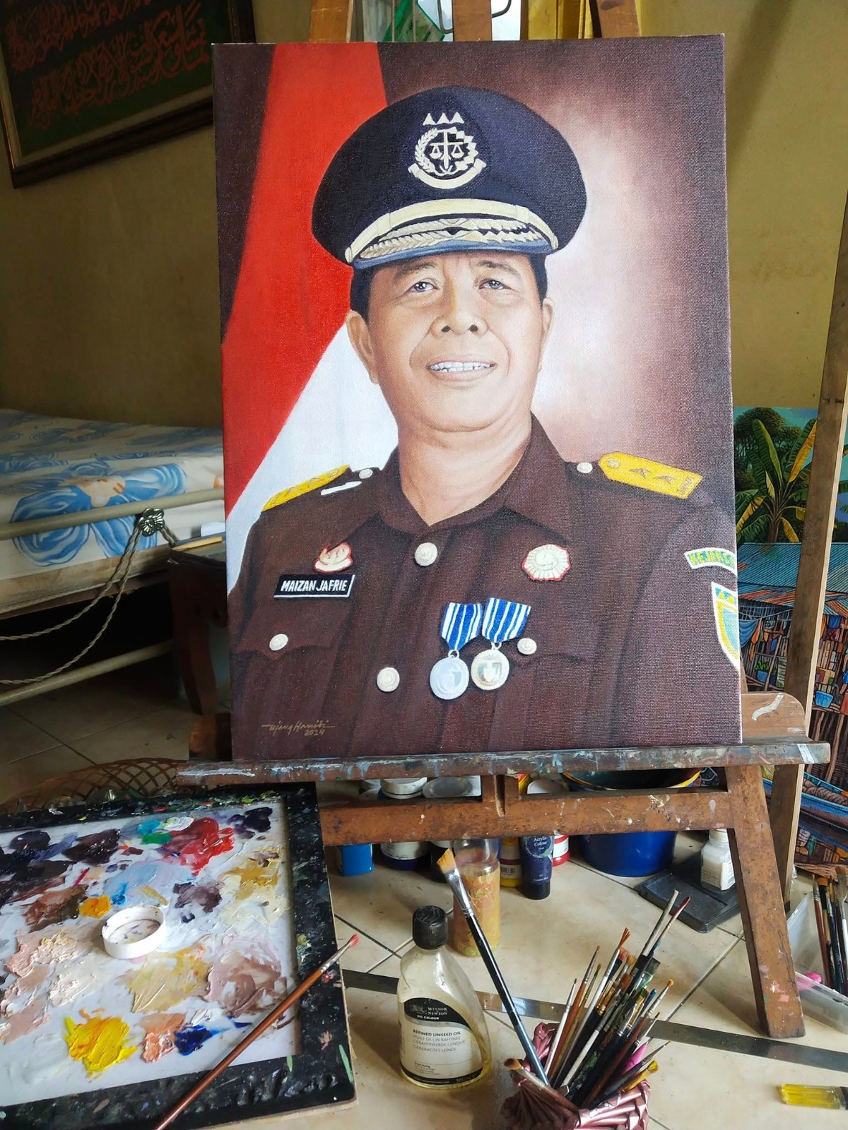 Lukisan potret salah seorang Tokoh Publik karya Ujang Hamidi