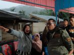Lima Rumah dan Jembatan Hanyut di Nagari Taluak Lintau Buo