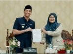 Wali Kota Sawahlunto Riyanda Putra Sampaikan Ranperda Pertanggungjawaban APBD 2025, Raih WTP ke-11 Berturut-turut Wali Kota Sawahlunto Riyanda Putra Sampaikan Ranperda Pertanggungjawaban APBD 2025, Raih WTP ke-11 Berturut-turut