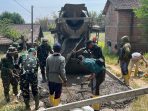 Satgas TMMD ke-129 Kodim 0813 Bojonegoro Kencangkan Pengecoran Jalan Dusun Mundu Bikin Akses Jalan Lebih Layak Satgas TMMD ke-129 Kodim 0813 Bojonegoro Kencangkan Pengecoran Jalan Dusun Mundu Bikin Akses Jalan Lebih Layak
