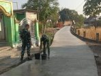 Menjaga Napas Jalan Baru, Dedikasi Satgas TMMD ke-129 Kodim 0813 Bojonegoro Merawat Impian Warga Kesongo
