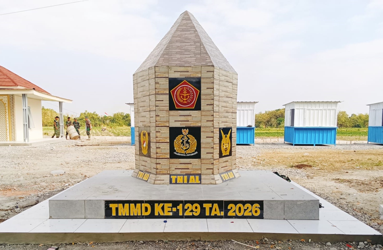 Tugu TMMD ke-129 Kodim 0813 Bojonegoro Kokoh Berdiri di Rest Area Terpadu Desa Kesongo